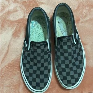 Vans slip on checkered board